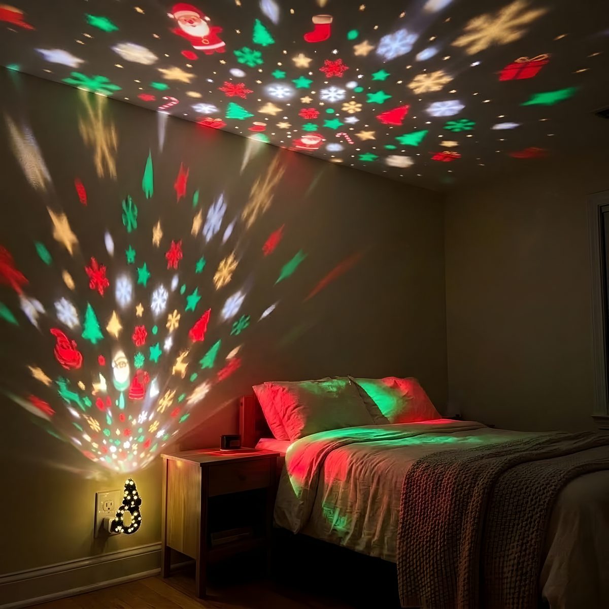 Lights off: Christmas shapes across the bedroom ceiling